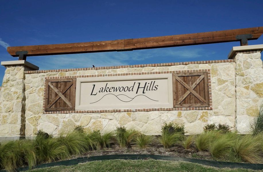 Stone and timber Lakewood Hills neighborhood entrance monument